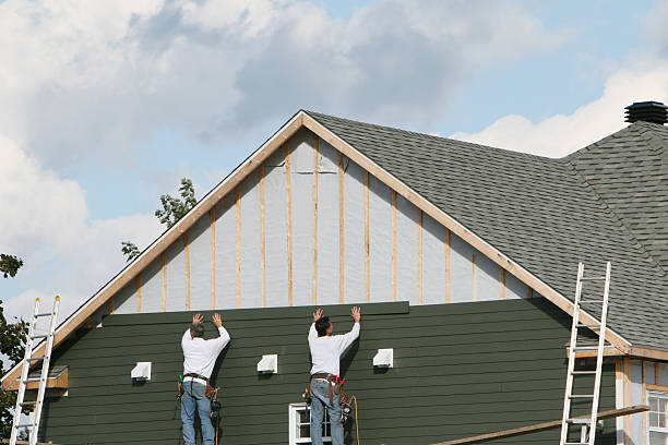 Professional Siding Contractor technician working in Centereach, NY